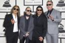 (L-R) Musicians Kirk Hammett, Lars Ulrich, Robert Trujillo and James Hetfield of Metallica arrive on the red carpet for the 56th Grammy Awards at the Staples Center in Los Angeles on January 26, 2014