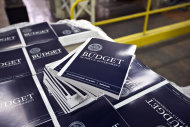 <p> FILE - In this April 8, 2013, photo, copies of President Barack Obama's budget plan for fiscal year 2014 are prepared for delivery at the U.S. Government Printing Office in Washington. The Treasury reports on the budget deficit for June on July 10, 2013. (AP Photo/J. Scott Applewhite, File)