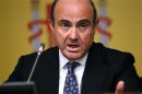 Spain's Economy Minister Luis de Guindos attends a news conference at the economy ministry in Madrid