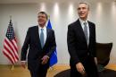 US Secretary of Defense Ash Carter (L) walks with NATO Secretary General Jens Stoltenberg at NATO headquarters in Brussels on February 10, 2016