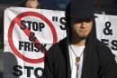 People attend a news conference against the Stop-and-Frisk program, outside the Federal Court in New York