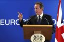 Britain's PM Cameron holds a news conference during EU leaders summit in Brussels