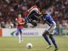 Costa Rica's Campbell fights for ball with Honduras' Bernardez during 2014 World Cup qualifying soccer match in San Jose