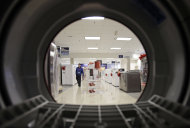 <p> FILE - In this Dec. 6, 2012, photo, an employee walks through the appliance department at a Sears in North Olmsted, Ohio. Sears Holdings Corp. reports quarterly financial results before the market opens on Thursday, May 23, 2013. (AP Photo/Mark Duncan, File)