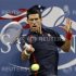 Novak Djokovic of Serbia returns a shot to Paolo Lorenzi of Italy during their match at the US Open