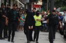 Spanish police arrest an 18-year-old Moroccan woman suspected of recruiting other women via the Internet to the jihadist group Islamic State (IS), in Gandia on September 5, 2015