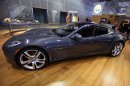 FILE - In this Nov. 18, 2010 file photo, Fisker Automotive's Fisker Karma, a sports luxury plug-in hybrid car, sits on display at the 2010 Los Angeles Auto Show in Los Angeles. Fisker says Saturday, Aug. 18, 2012, it is recalling the Karma sedan to fix cooling fans that can catch fire. (AP Photo/Damian Dovarganes, File)