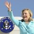 FILE - In this June 10, 2011 file photo, Secretary of State Hillary Rodham Clinton waves as the arrives at Lusaka International Airport in Lusaka, Zambia. If diplomatic achievements were measured by the number of countries visited, Hillary Rodham Clinton would be the most accomplished secretary of state in history. Since becoming secretary of state in 2009, Clinton has logged 351 days on the road, traveled to 102 countries and flown a whopping 843,839 miles, according to the State Department. (AP Photo/Susan Walsh, Pool)