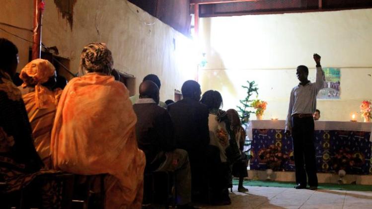 Christian southern Sudanese celebrate Christmas mass in the Soba district of southern Khartoum on December 25, 2010