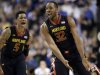 Maryland's Dez Wells (32) and Nick Faust (5) react after a basket against Duke during the first half of an NCAA college basketball game at the Atlantic Coast Conference men's tournament in Greensboro, N.C., Friday, March 15, 2013. (AP Photo/Bob Leverone)