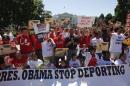 Anti-deportation protesters chant in front of the White House in Washington