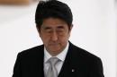 Japan's PM Abe attends a memorial service ceremony marking the the 69th anniversary of Japan's surrender in World War Two, at Budokan Hall in Tokyo