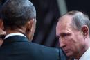 US President Barack Obama (L) and Russia's President Vladimir Putin before a meeting in Lima in November