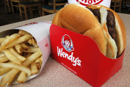 FILE - In this Monday, May 6, 2013, file photo, a Wendy's single with cheese large combo meal is photographed at a Wendy's restaurant in Mt. Lebanon, Pa. The Wendy's Co. reports quarterly financial results before the market opens on Thursday, Nov. 7, 2013. (AP Photo/Gene J. Puskar, File)