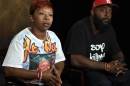 The parents of Michael Brown, Lesley McSpadden, left, and Michael Brown, Sr., right, speak to The Associated Press during an interview in Washington, Saturday, Sept. 27, 2014. Michael Brown's parents say they are unmoved by the Ferguson police chief's apology in their son's shooting death by a police officer. Instead, Lesley McSpadden and Michael Brown Sr. told The Associated Press they would rather see an arrest, and Brown Sr. said he wants the police officer "in handcuffs." (AP Photo/Susan Walsh)