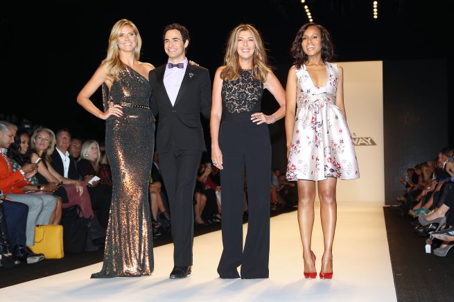 This image released by Starpix shows, from left, host Heidi Klum, designer Zac Posen, Nina Garcia and actress Kerry Washington at the "Project Runway" show during Fashion Week in New York on Friday, Sept. 6, 2013. (AP Photo/Starpix, Kristina Bumphrey)