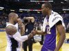 Former teammates Orlando Magic's Jameer Nelson, left, and Los Angeles Lakers' Dwight Howard (12) shake hands before leaving the court at the end of an NBA basketball game, Tuesday, March 12, 2013, in Orlando, Fla. Los Angeles won the game 106-97.(AP Photo/John Raoux)