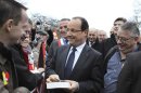 France's President Francois Hollande Swiss Petroplus Petit-Couronne refinery workers in Val-de-Reuil