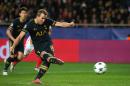 Tottenham Hotspur's striker Harry Kane kicks the ball against Monaco on November 22, 2016