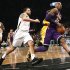 Los Angeles Lakers' Bryant drives past Brooklyn Nets' Williams during the first quarter of their NBA basketball game in Brooklyn, New York