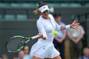 Spain's Garbine Muguruza returns against Slovakia's Jana Cepelova during their women's singles second round match on the fourth day of the 2016 Wimbledon Championships at The All England Lawn Tennis Club on June 30, 2016