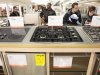 Shoppers look at appliances at a Home Depot store in New York