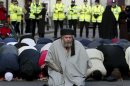 File photograph shows Muslim cleric Abu Hamza al-Masri leading prayers outside the North London Central Mosque, in north London
