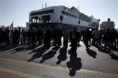Seamen take part in a protest during the first day of a 48-hour strike at the port of Piraeus, near Athens