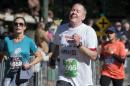 Robert Schenk, of Brick N.J., nears the finish line during the "Stephen Siller Tunnel to Towers" memorial event in New York, Sunday, Sept. 25 2016. The sponsors of the run honoring New York firefighter Stephen Siller, who died at the World Trade Center on Sept. 11, 2001, invited participants, including Schenk, of the Seaside, N.J., Semper Five Marine Corps charity run that was cancelled last week after a pipe bomb exploded along the route. (AP Photo/Craig Ruttle)