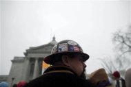 A union iron worker attends a rally outside of the Capitol building to protest against a proposed bill by Republican Governor Scott Walker in Madison, Wisconsin February 21, 2011. REUTERS/Darren Hauck