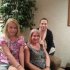 This photo provided by the family shows, from left, Jolene, Janet and Gabrielle Dunnabeck at their home in Whitney, Texas on Monday, July 1, 2013. The Federal Aviation Administration said Monday it is investigating a close call between a Texas-bound Spirit Airlines flight they were aboard and a skydiving plane that forced the jetliner to dive sharply over Michigan on Sunday evening. "It was horrifying," Janet Dunnabeck said. "Every person on that plane was screaming. We thought we were going down." She added the plunge caused overhead luggage bins to spill open, drinks to spill and flight attendants to bump their heads. (AP Photo)