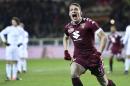 Torino's Andrea Belotti celebrates after he scored during a Serie A soccer match between Torino and Milan, at Turin's Olympic stadium, Italy, Monday, Jan. 16, 2017. (Alessandro Di Marco/ANSA via AP)