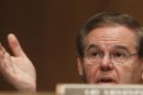 Senator Menendez, a member of Senate Banking, Housing and Urban Affairs Committee, asks questions during testimony in Washington