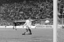 FILE - In this July 3, 1974 file photo, Dutch forward Johann Cruyff scores his team?s second goal against Brazil in their World Cup Soccer match, in Dortmund, West Germany. On this day: The Netherlands beats Brazil 2-0 to qualify for the World Cup final. (AP Photo, File)