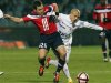 Lille's Joe Cole fights for the ball with Dijon's Thomas Guerbert during their French Ligue 1 soccer match at Lille Metropole Stadium in Villeneuve d'Ascq