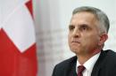 Swiss President Burkhalter addresses a news conference on results in Bern