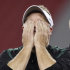 Oregon head coach Chip Kelly wipes his eyes after the Fiesta Bowl NCAA college football game, Thursday, Jan. 3, 2013, in Glendale, Ariz. Oregon defeated Kansas State 35-17.(AP Photo/Paul Connors)