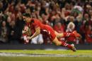 Wales' Rhys Webb scores against Australia during their international rugby union match at the Millennium Stadium, Cardiff, Saturday Nov. 8, 2014. (AP Photo/PA, Andrew Matthews) UNITED KINGDOM OUT NO SALES NO ARCHIVE