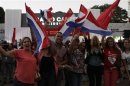 Supporters of Paraguayan presidential candidate Cartes of the Colorado Party celebrate in Asuncion