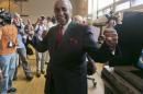 Congressman Charles Rangel, D-N.Y., flashes a thumbs-up after voting in the congressional primaries, Tuesday, June 24, 2014, in New York. Rangel, 84, one of the most recognizable members of the Congressional Black Caucus, faces multiple challengers in his primary as he aims for a 23rd term representing demographically shifting areas of New York City. Rangel's top challenger is state Sen. Adriano Espaillat, who would become the first Dominican-born member of Congress. (AP Photo/Richard Drew)