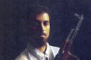 FILE - This section of an undated file photo released by the U.S. Attorney's Office, which had been presented as a government exhibit at a 2011 hearing, shows Rezwan Ferdaus, of Ashland, Mass. Ferdaus is scheduled to plead guilty Friday, July 20, 2012 in Boston federal court to attempting to provide material support to terrorists and attempting to damage and destroy federal buildings by means of an explosive. (AP Photo/U.S. Attorney's Office, File)