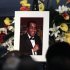 A portrait of the late boxing trainer Emanuel Steward is seen during his funeral service at the Greater Grace Temple in Detroit, Tuesday, Nov. 13, 2012. (AP Photo/Carlos Osorio)