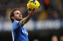 Juan Mata holds the ball during the Premier League game between Chelsea and Swansea City at Stamford Bridge in London on December 26, 2013