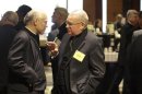 Bishop Salvatore Cordileone and Bishop Walter Edyvean chat after an executive session in Bellevue, Washington