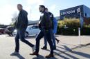Ericsson workers walk outside the Ericsson factory in Boras