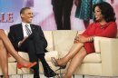 President Barack Obama and first lady Michelle Obama are pictured with Oprah Winfrey during a taping of The Oprah Winfrey Show at Harpo Studios in Chicago, Wednesday, April 27, 2011. (AP Photo/Charles Dharapak)