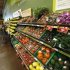 Shoppers stand by the vegetables aisle inside a Fresh & Easy store in Burbank