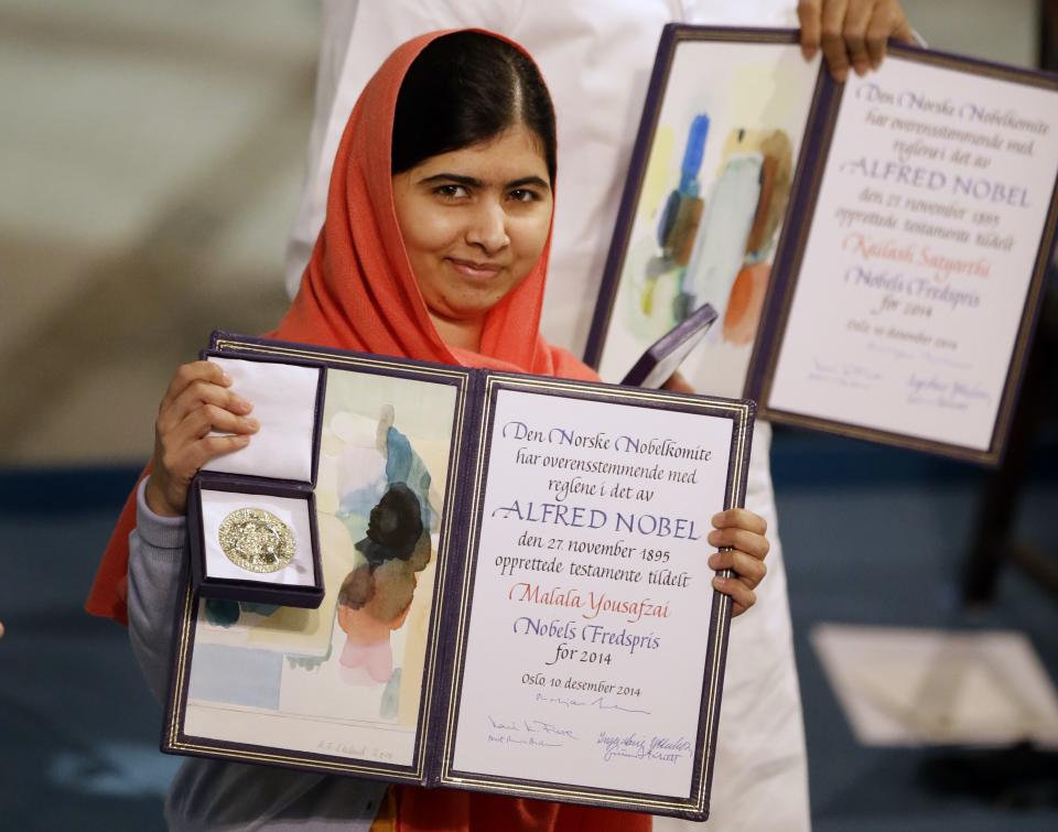 Nobel Peace Prize winners Malala Yousafzai from Pakistan, front,  and Kailash Satyarthi of India are awarded their Nobel Peace Prize during the Nobel ...