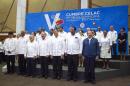 Heads of state pose for the official photo of the V Summit of the Community of Latin American and Caribbean States in Bavaro, Dominican Republic, Wednesday, Jan. 25, 2017. (AP Photo/Tatiana Fernandez)