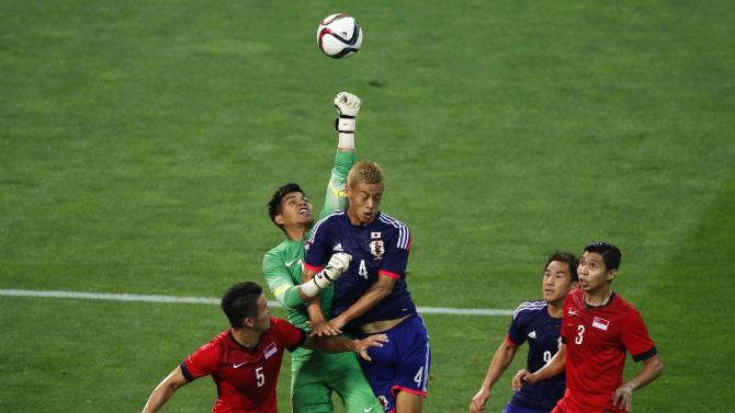 Japan held to 0-0 by Singapore in Asian World Cup qualifier.